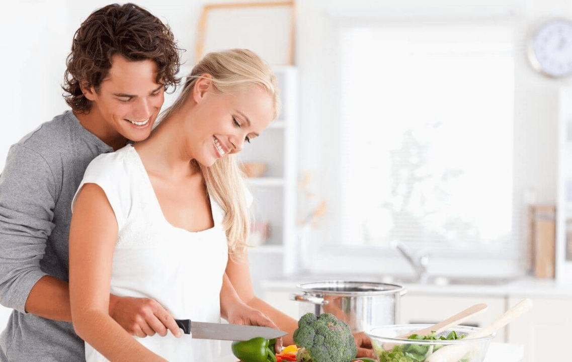 Young couple cooking
